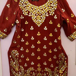 DARK RED/ MAROON with hot pink dupatta. Gold and silver embellishment